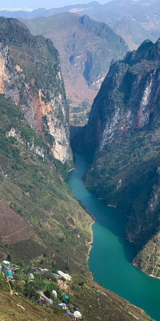 blue river and towering mountains Ma Pi Leng