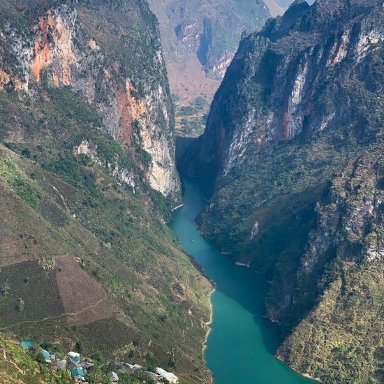 blue river and towering mountains Ma Pi Leng